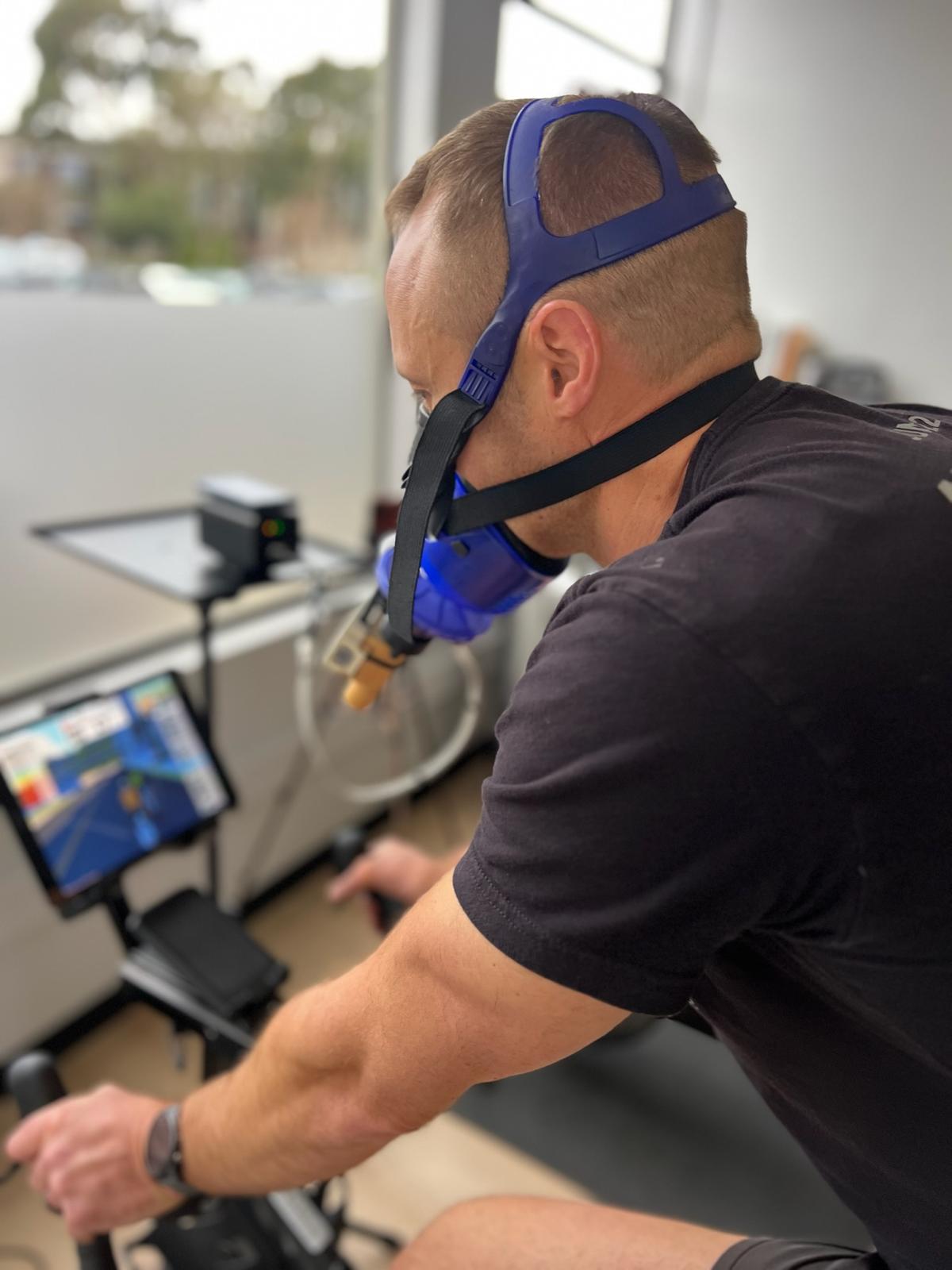 A man gauging cardiomuscular fitness level during Active Metabolic (VO2 max)
